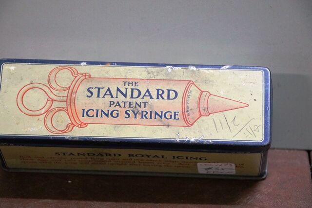 A Vintage Standard Icing Syringe Tin With Contents