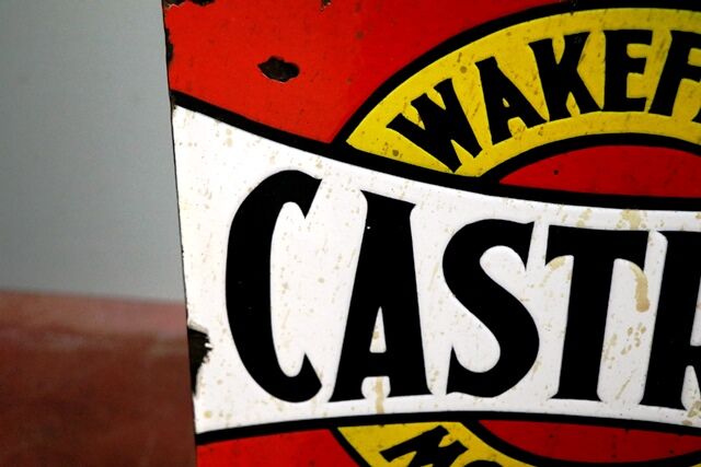 Vintage Castrol Embossed 6 Bottle Rack with Tin Tops