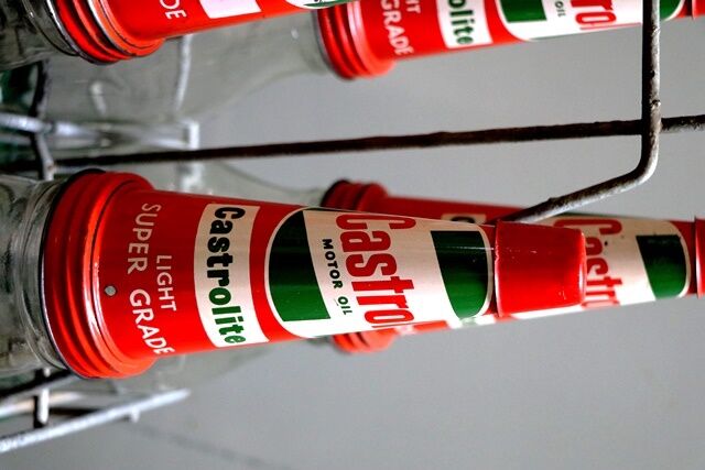 Vintage Castrol Embossed 6 Bottle Rack with Tin Tops