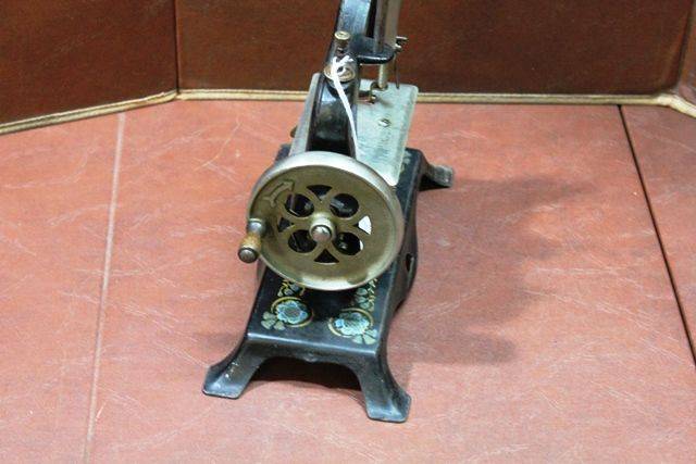 A German Casige No13 Tin Plate Miniature Sewing Machine