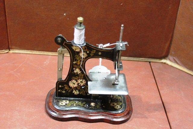 Early 1900and39s Muller Toy Sewing Machine 