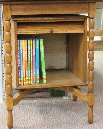 Oak Revolving Display Cabinet with Rolling Front and Back Doors
