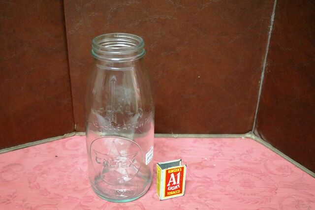 A Good Vintage Caltex One Quart Oil Bottle