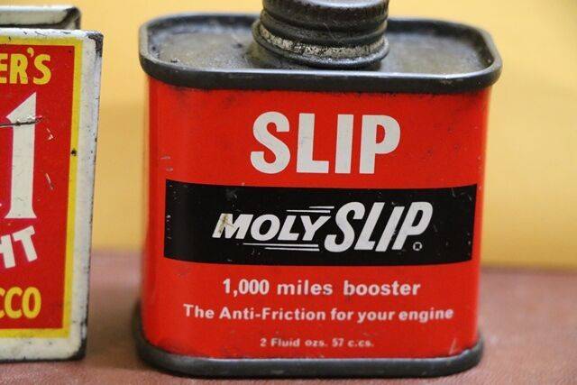A Small Vintage Moly Slip 2 Fluid ozs Tin