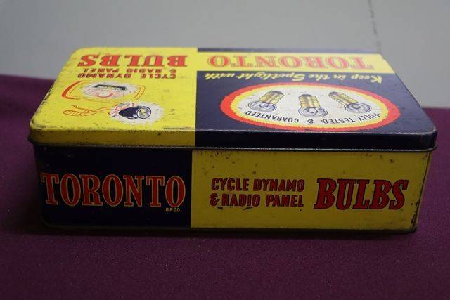A Tornto Bulbs Dispensing Tin With Partial Contents 