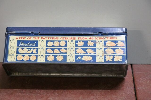 A Vintage Standard Icing Syringe Tin With Contents
