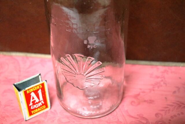 Early Vintage Embossed One Quart Oil Bottle