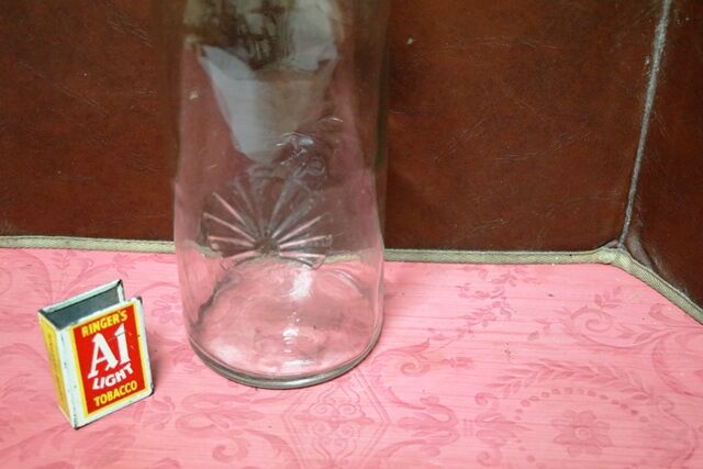 Early Vintage Embossed One Quart Oil Bottle