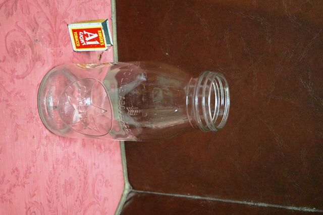 Vintage Caltex Embossed 1qt Oil Bottle 