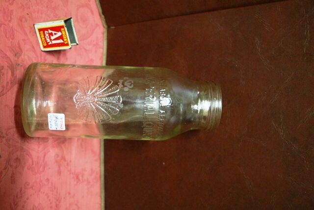 Vintage Embossed Shell 1 quart Oil Bottle