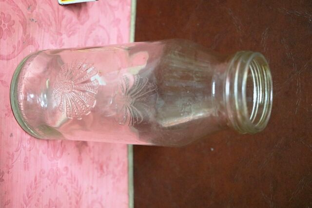 Vintage Embossed Shell 1 quart Oil Bottle