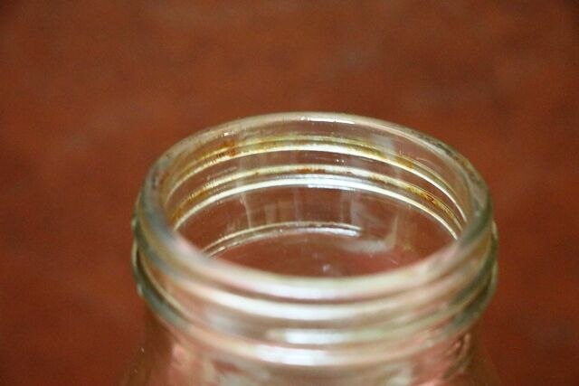 Vintage Embossed Shell 1 quart Oil Bottle