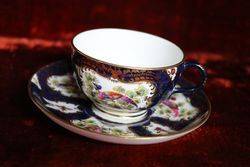 Royal  Blue   Ground Cup and Saucer Painted Exotic Birds By CJohnson C1917