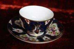 Royal  Blue   Ground Cup and Saucer Painted Exotic Birds By CJohnson C1917