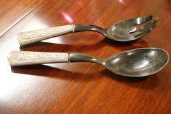 Pair Of Silver Handle Servers 