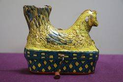 A Baldwin MFG Company Clockwork Tinplate Model Of A Hen Nesting #