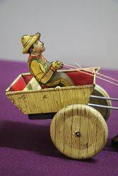 A Mark Toys Clockwork Tinplate Model Of A Donkey Pulling A Cart  