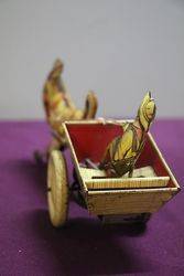 A Mark Toys Clockwork Tinplate Model Of A Donkey Pulling A Cart  