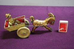 A Mark Toys Clockwork Tinplate Model Of A Donkey Pulling A Cart  