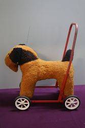 A PushAlong Soft Toy Dog On Wheels 