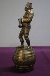 Well Cast Brass Triple X Pub Figure Standing On a Barrel 