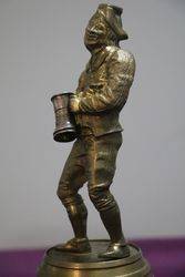 Well Cast Brass Triple X Pub Figure Standing On a Barrel 