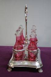 6 Bottle Ruby Cruet EPNS Stand C1910 With Later C20th Bottles 