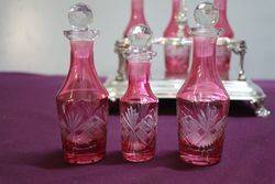 6 Bottle Ruby Cruet EPNS Stand C1910 With Later C20th Bottles 