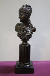 An Antique Bronze Bust on Black Marble Column. #