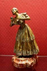 A Genuine Antique Bronze Figure of a Woman.