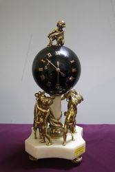 French Bell Strike Clock In Round Black Ball On top Of Cherubs 