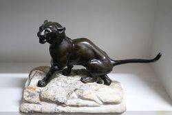 A Genuine Antique Victorian Bronze Lion on Marble Rock Style Base