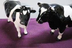 Genuine Beswick Frisian Bull and Cow 