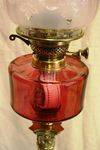 Late Victorian Ruby Glass Oil Lamp Arriving