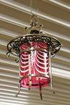 Pair Of Bronze And Ruby Overlay Glass Hanging Lamps