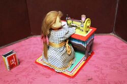 1950s Japanese TN Co Tinplate Dolly Dressmaker Toy