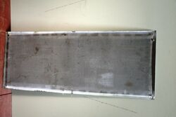 1964 Castrol L The Masterpiece in Oil Tin Advertising Sign 