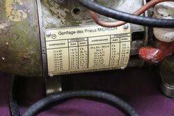 A Vintage Michelin Bomb Compressor 