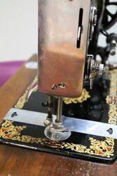 A Vintage Jones Table Top Sewing Machine