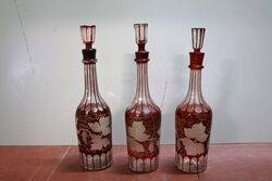 Three Matching Antique Bohemian Flash Ruby Decanters. #
