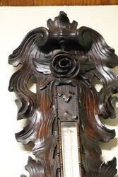 A Very Large Antique profusely carved oak barometer 