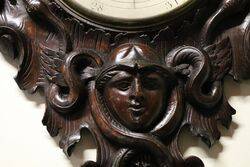 A Very Large Antique profusely carved oak barometer 