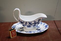 A Quality Dresden Gravy Boat with Fixed Stand. #
