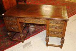 Early C20th Carved Oak 7 Drawer Writing Desk.#