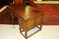 Early C20th Carved Oak 7 Drawer Writing Desk