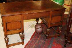 Early C20th Carved Oak 7 Drawer Writing Desk