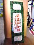 OGDENS SMILAX STRIP SIGN ---ST86