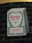 OGDENS SMILAX STRIP SIGN ---ST86