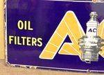 AC Oil Filters + Plugs Pictorial Enamel Sign