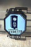 Vedette Wall Clock Double Sided Enamel Sign Arriving Nov